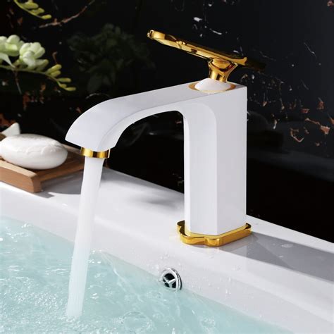 shower faucet with gold and white